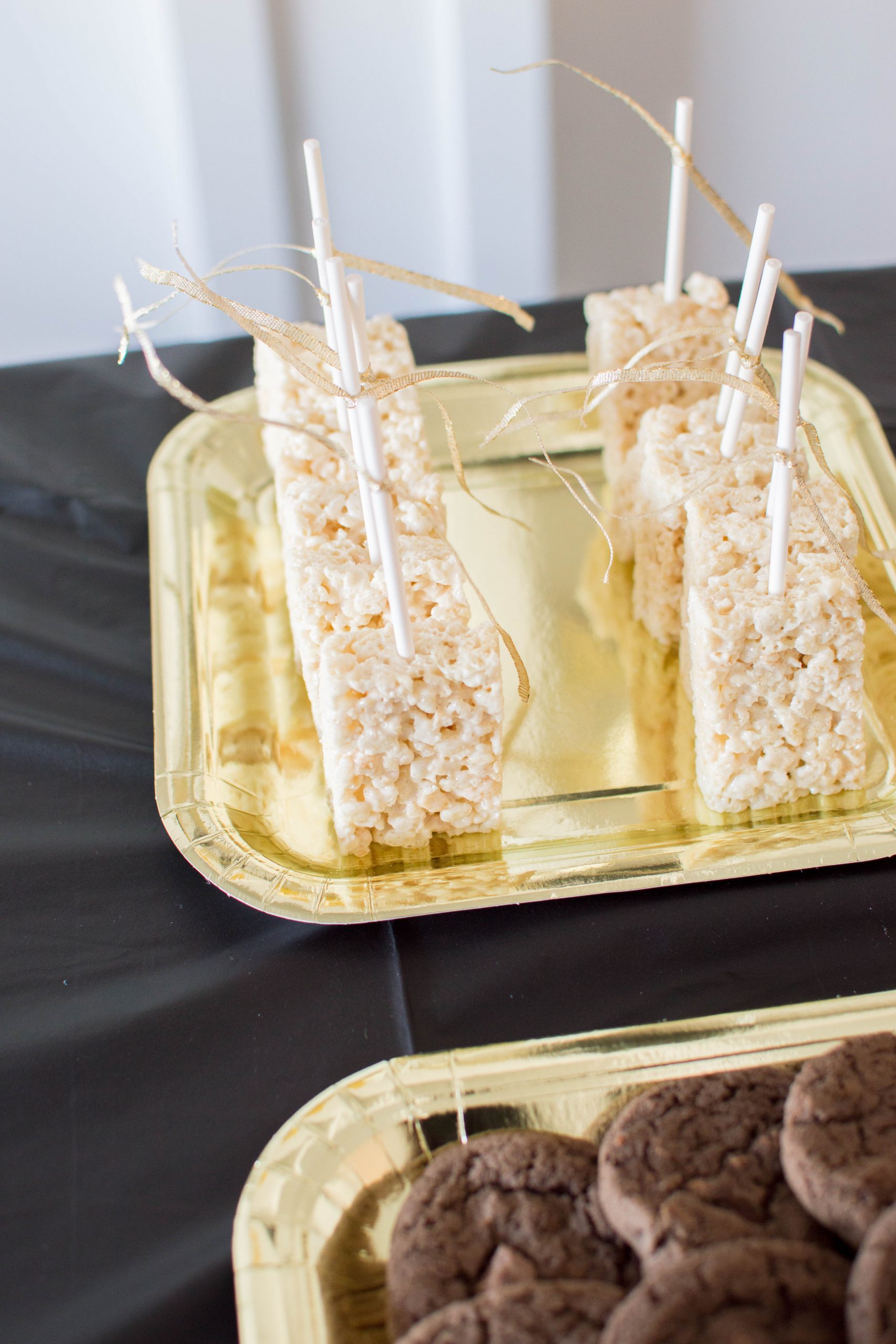Rice krispies treats with a gold ribbon to go with the theme of our Mr. Onederful birthday party!