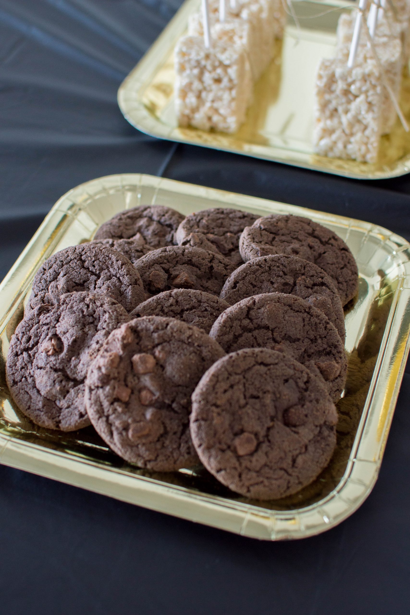 Dark chocolate cookies on a gold plate to go with the theme of our Mr. Onederful birthday party!